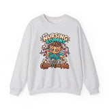 Nursing Student Sweatshirt — Powered by Coffee & Care Plans