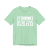 Orthodoxy Keeping It Real Since 33 AD shirt in Mint by Peckwear