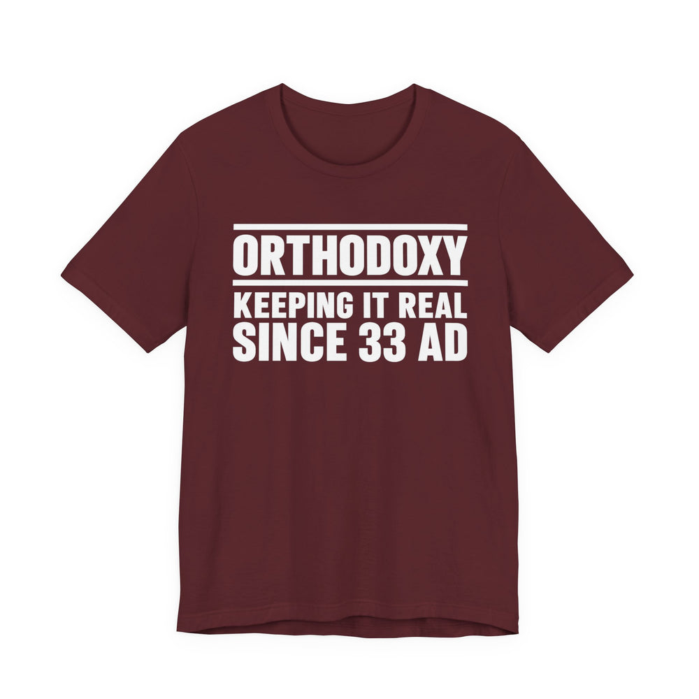 Orthodoxy Keeping It Real Since 33 AD shirt in Maroon by Peckwear