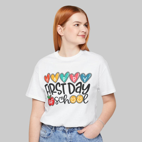 First Day of School teacher shirt with colorful lettering, hearts and apples