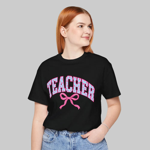 Pink bow teacher shirt with TEACHER lettering, pink bow and floral details