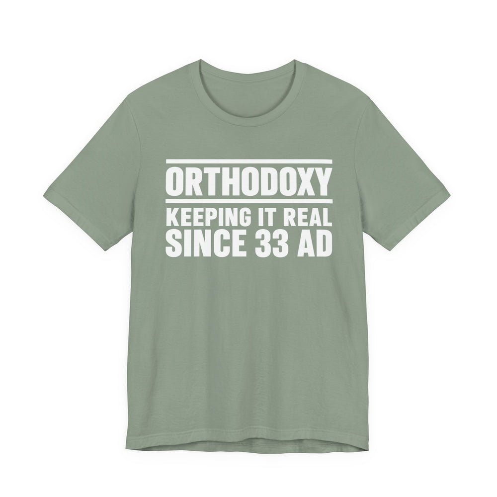 Orthodoxy Keeping It Real Since 33 AD shirt in Sage by Peckwear