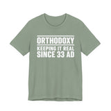 Orthodoxy Keeping It Real Since 33 AD shirt in Sage by Peckwear