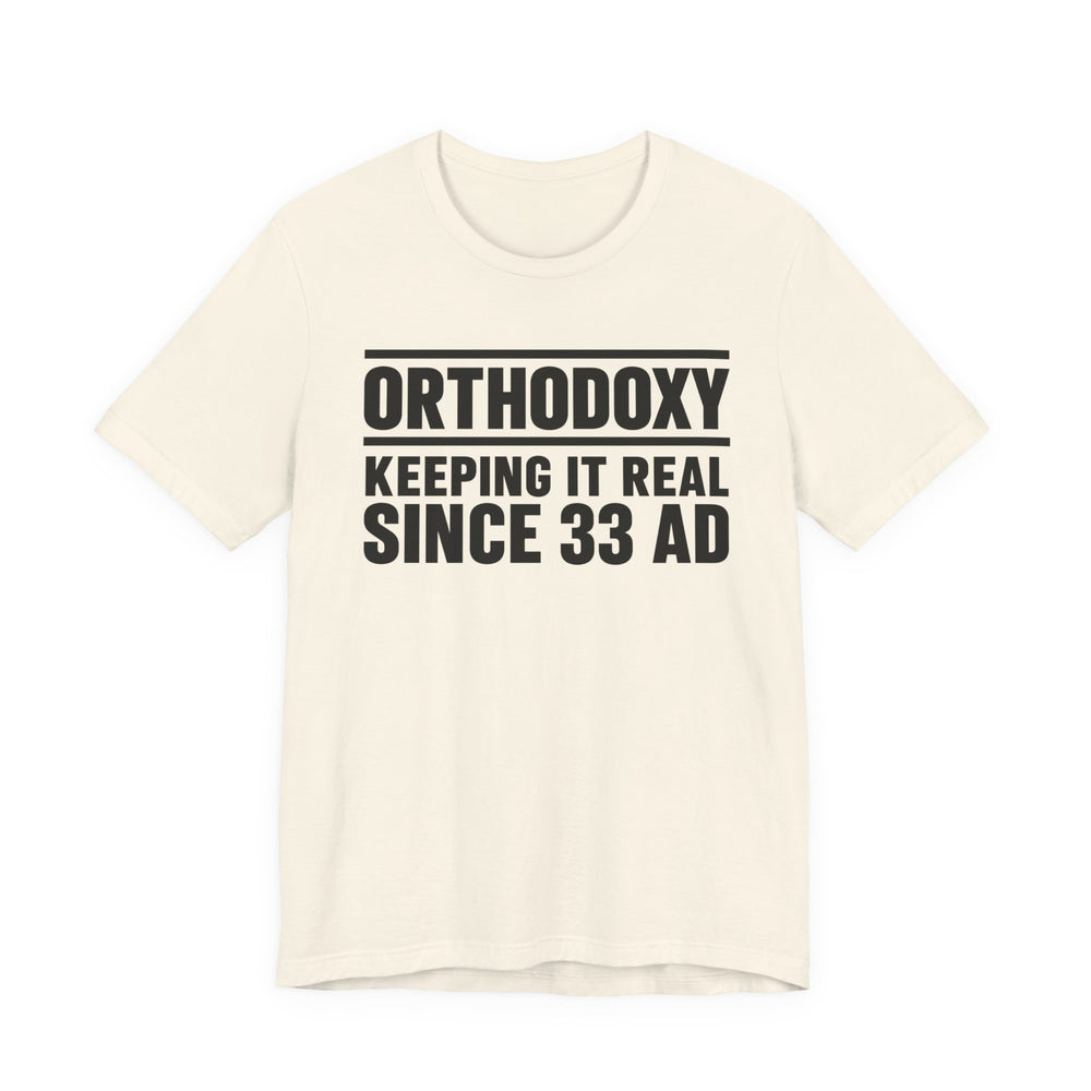 Orthodoxy Keeping It Real Since 33 AD shirt in Natural by Peckwear