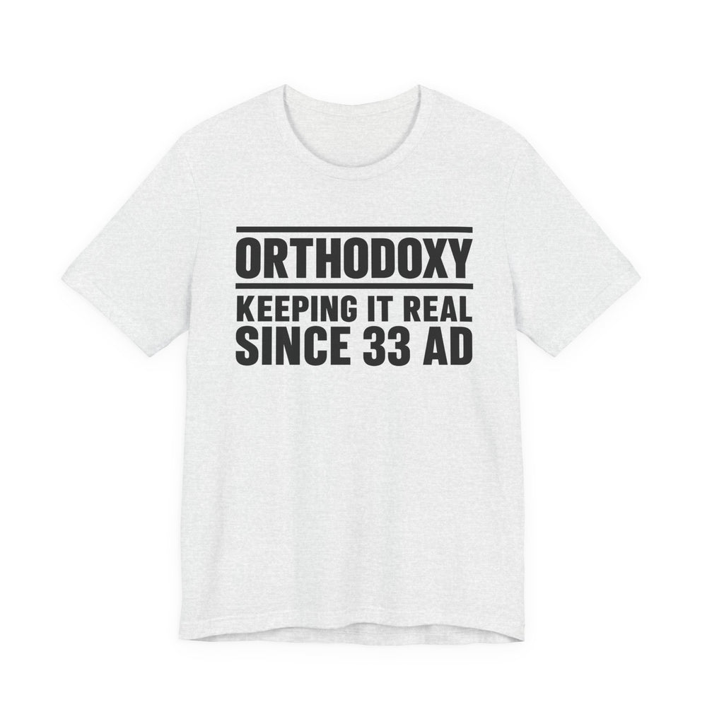 Orthodoxy Keeping It Real Since 33 AD shirt in Ash by Peckwear