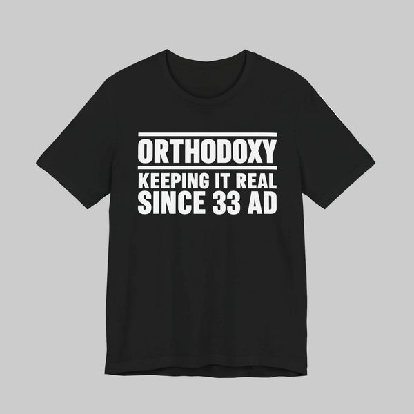 Orthodoxy Keeping It Real Since 33 AD shirt in Black by Peckwear