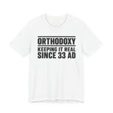 Orthodoxy Keeping It Real Since 33 AD shirt in White by Peckwear