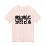 Orthodoxy Keeping It Real Since 33 AD shirt in Soft Pink by Peckwear